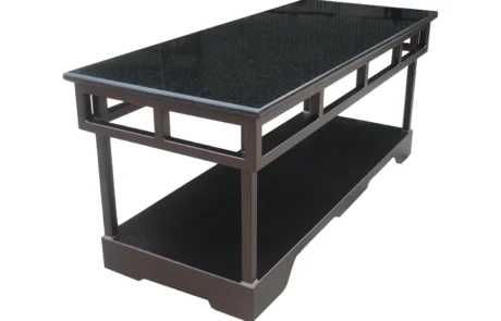 Black granite coffee break table Black granite coffee break table with fretwork base panels