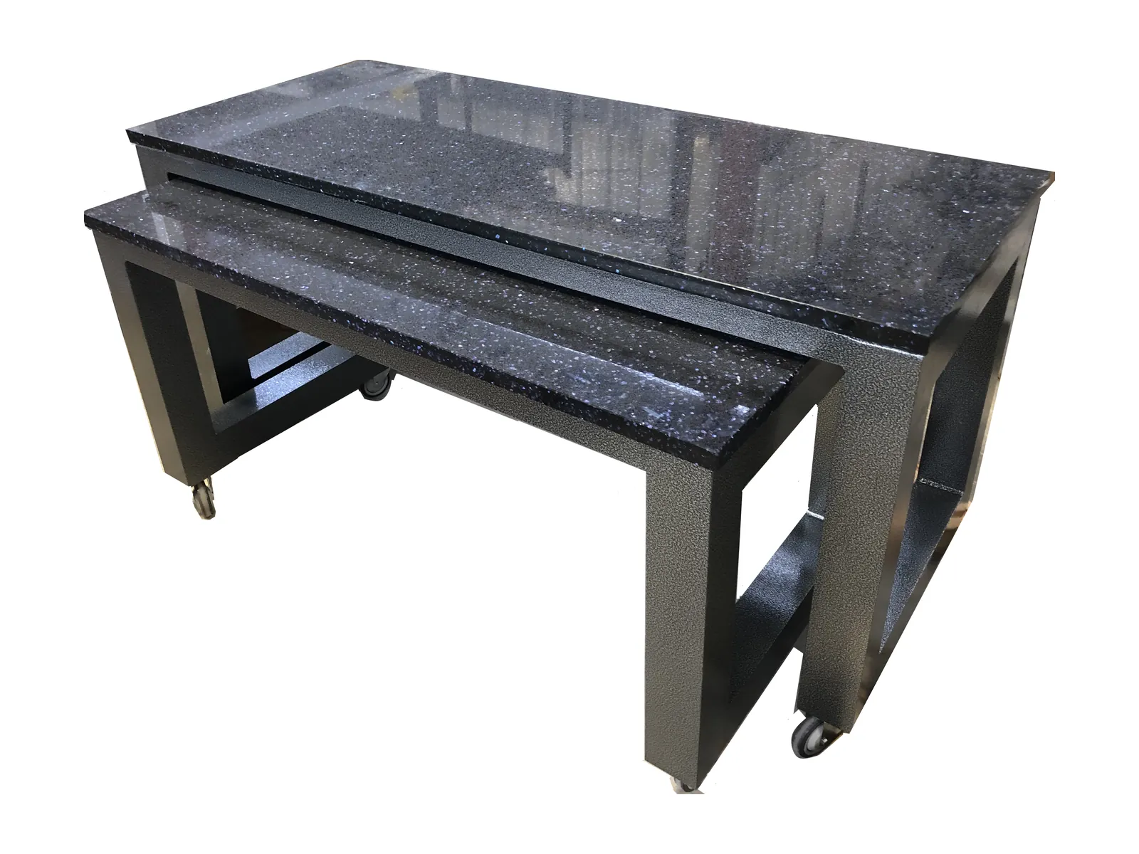 Nesting display tables Nesting display tables with dark granite tops